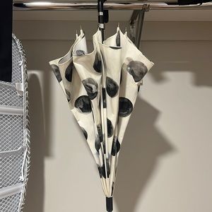 Black and white polka dot Dolce and Gabanna umbrella